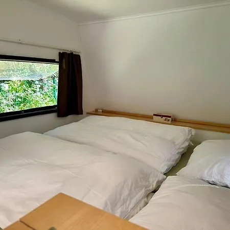 Holiday home Cozy Camper Surrounded By Forest Bieszkowice