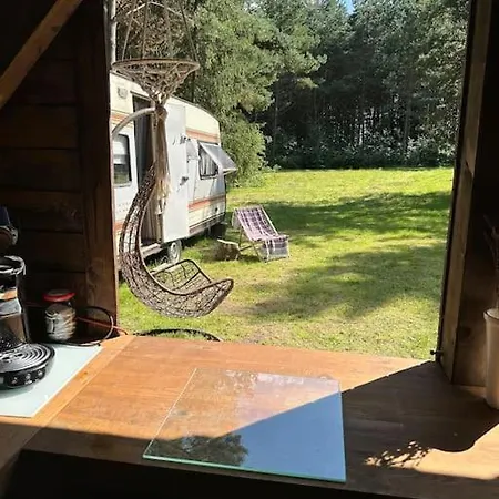 Cozy Camper Surrounded By Forest Holiday home